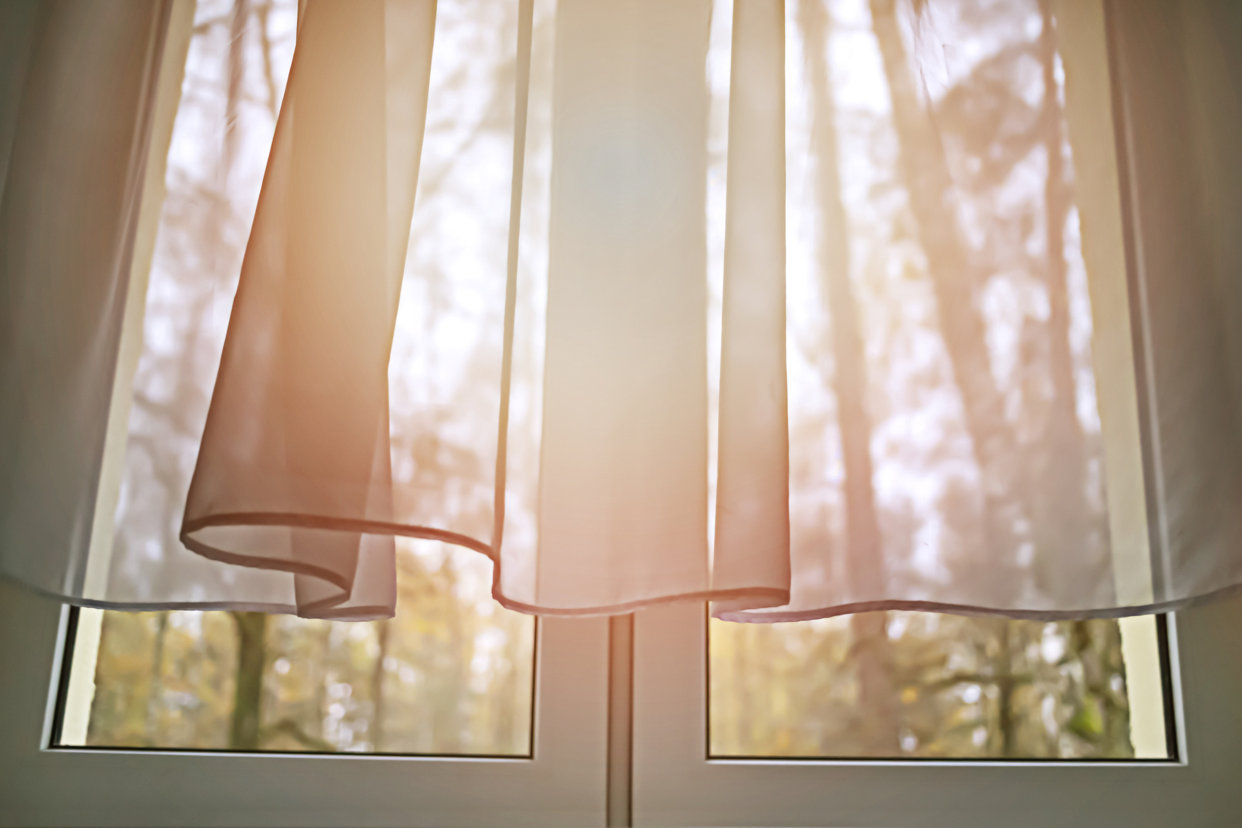 wind blows white transparent curtain