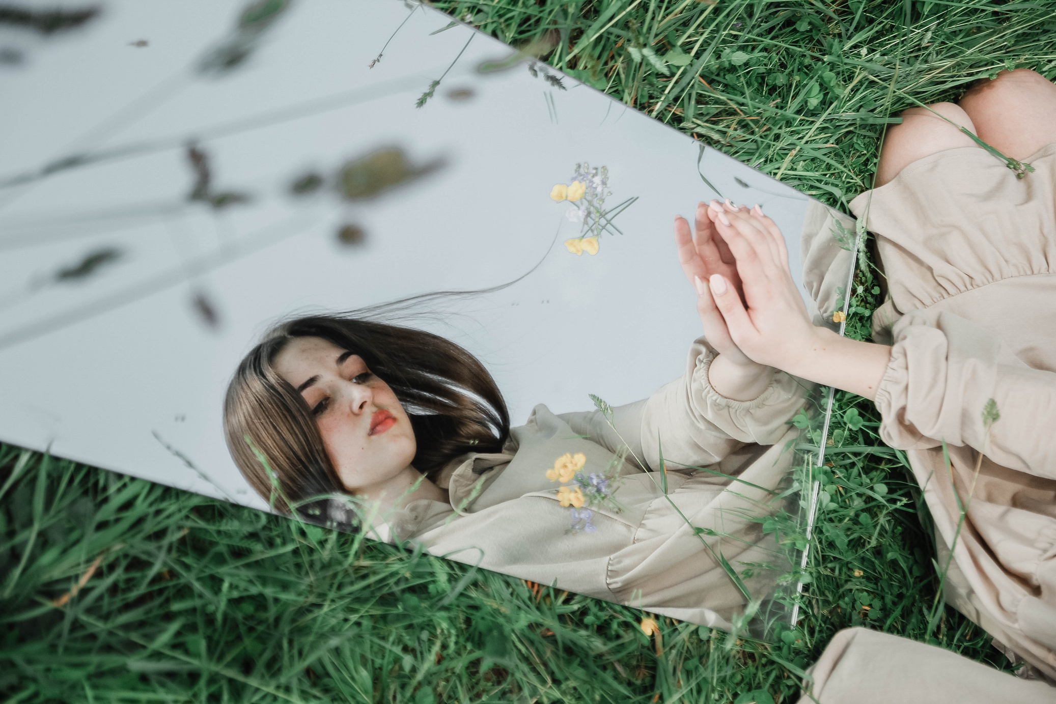 A Woman Reflection in a Mirror